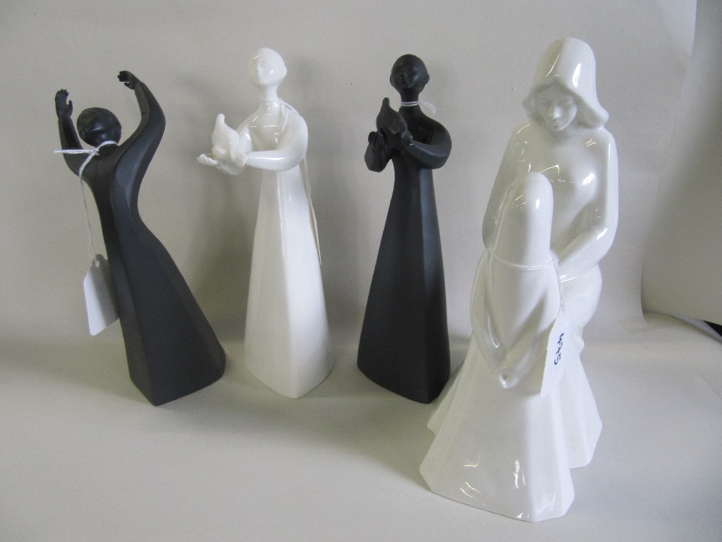 Appraisal: Four Doulton figures including Peace HN HN Awakening HN and