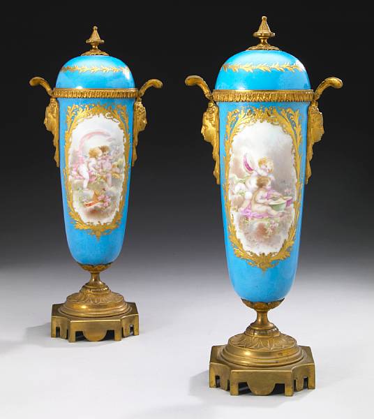 Appraisal: A pair of Sevres style gilt bronze mounted earthenware covered