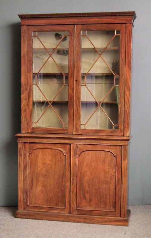 Appraisal: A late Victorian mahogany bookcase the upper part with moulded