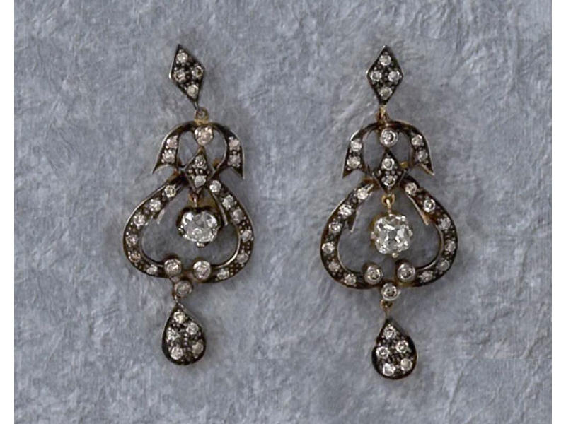 Appraisal: DIAMOND DROP EARRINGS k yellow gold silver topped antique style