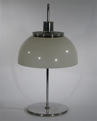 Appraisal: A Harvey Gazzini chromed metal table lamp with domed perspex