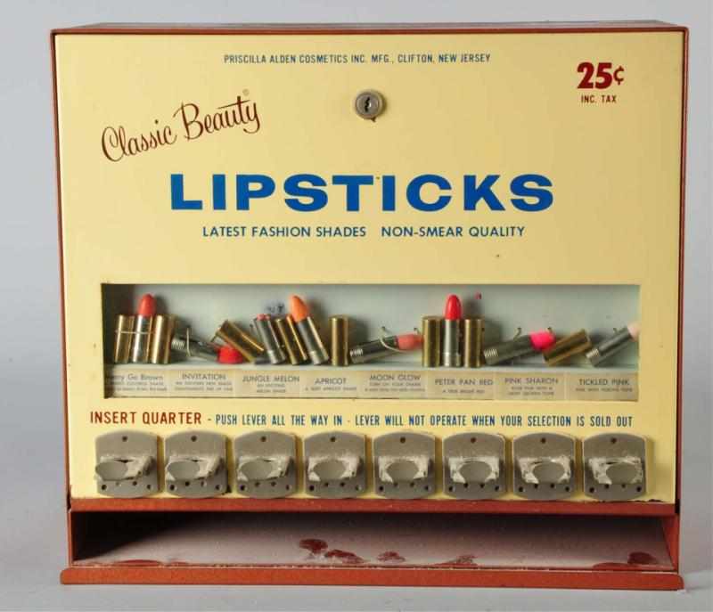 Appraisal: Classic Beauty Lipstick Dispenser Description Working Manufactured by Priscilla Alden