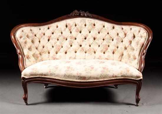 Appraisal: American Rococo Revival carved walnut upholstered settee circa floral button