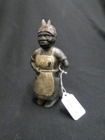 Appraisal: Black Americana Cast Iron Figural Bank woman in apron with