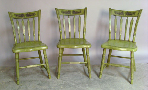 Appraisal: Three West Chester Pennsylvania painted plank seat chairs bearing the