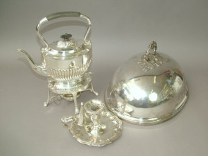 Appraisal: An Edwardian silver plated tea kettle on stand by Joseph