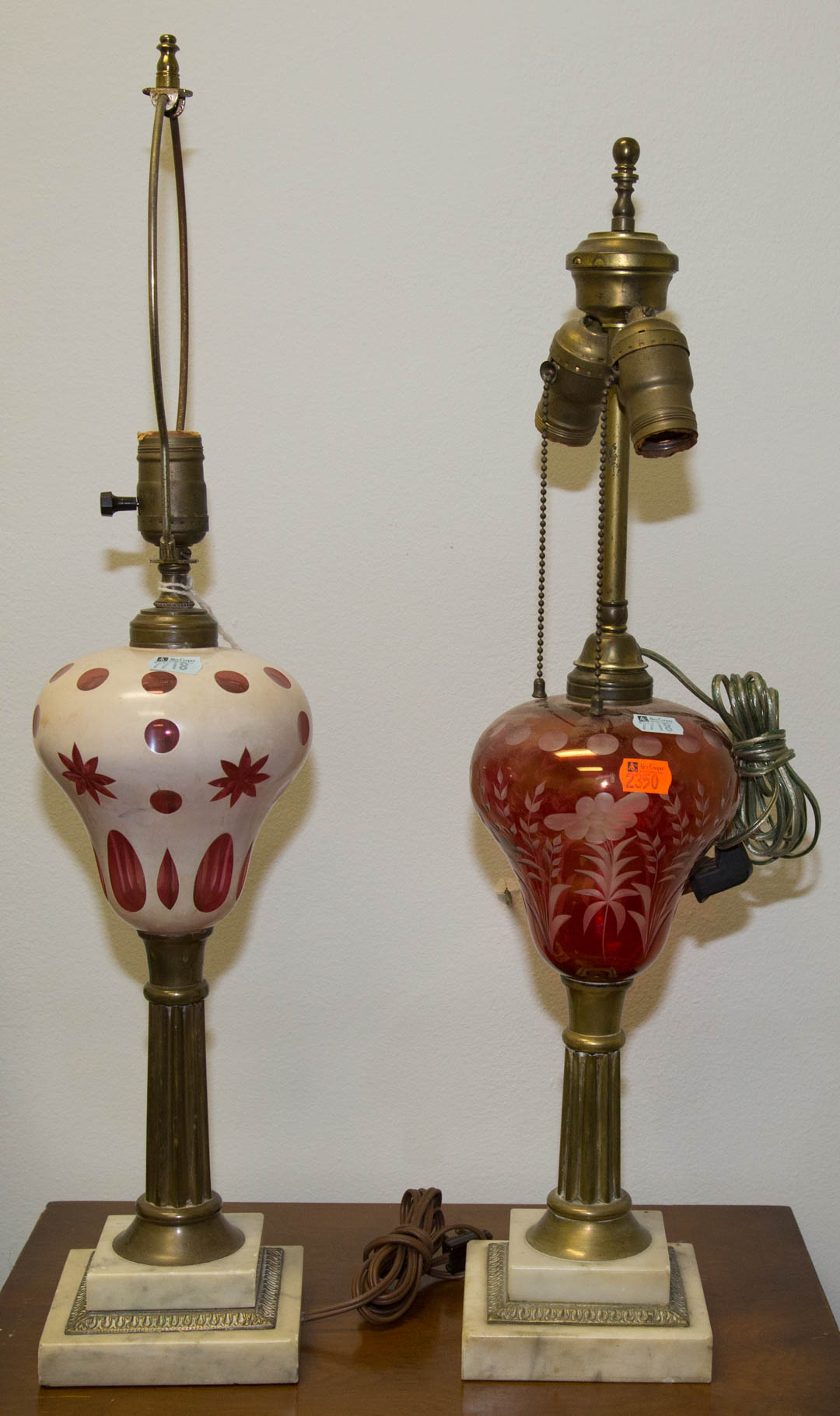 Appraisal: Two glass brass and marble fluid lamps