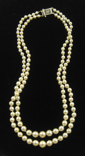 Appraisal: DOUBLE STRAND WHITE PEARL NECKLACE The choker length necklace measures