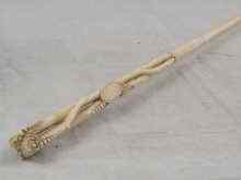 Appraisal: A finely carved ivory riding crop circa measuring approx cm