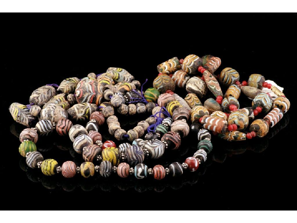 Appraisal: THREE MILLEFIORI TYPE SWIRL GLASS BEAD NECKLACES