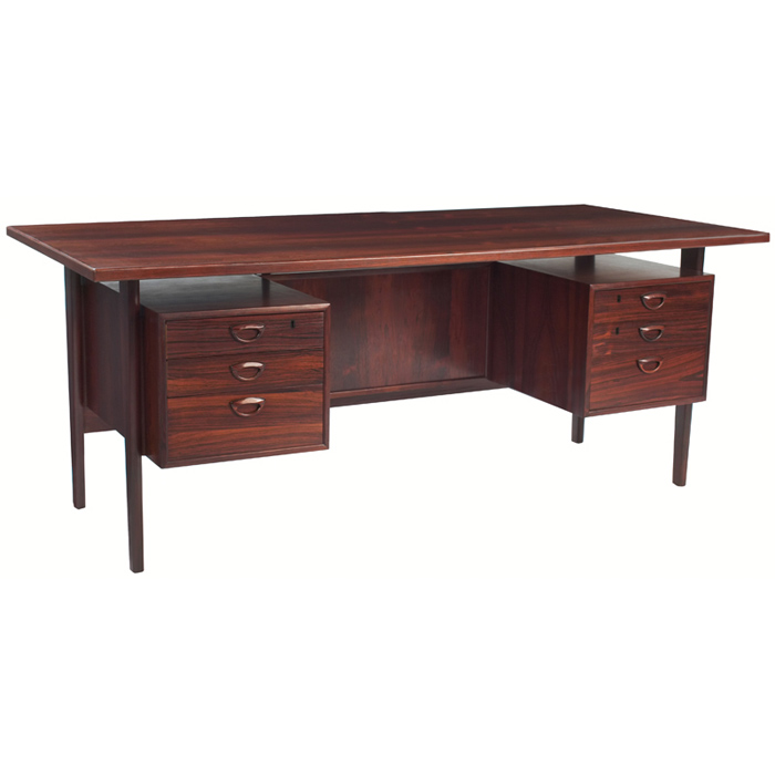 Appraisal: Danish Modern desk rosewood double-pedestal form with six floating drawers