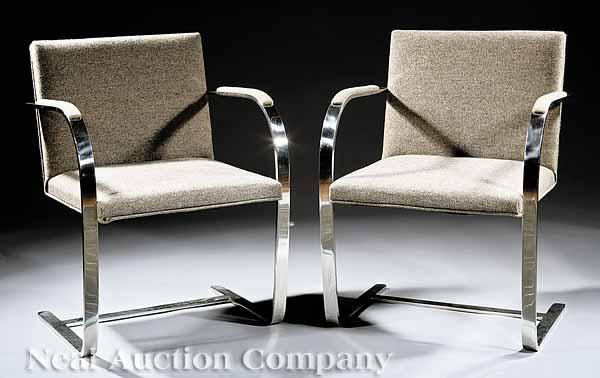 Appraisal: A Pair of Knoll International Chrome Armchairs after a design