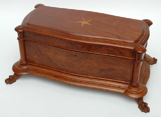 Appraisal: AN AUSTRALIAN CEDAR BOX Rectangular with turned pilasters to all