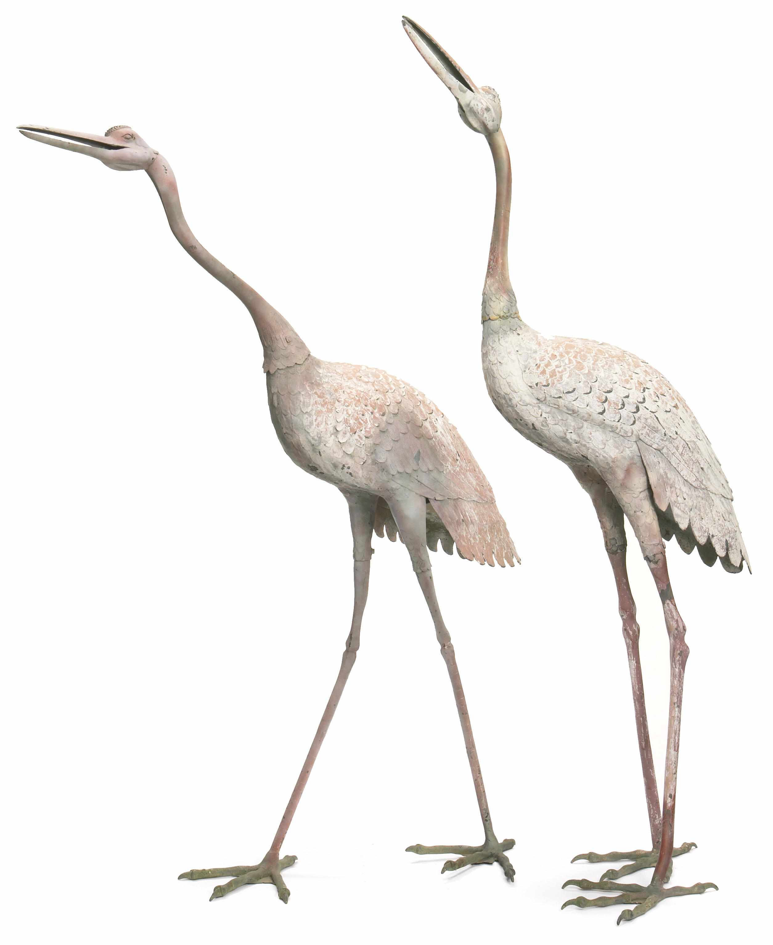 Appraisal: A pair of paint decorated metal models of cranes late