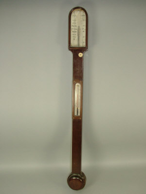 Appraisal: A th century mahogany cased stick barometer with thermometer and