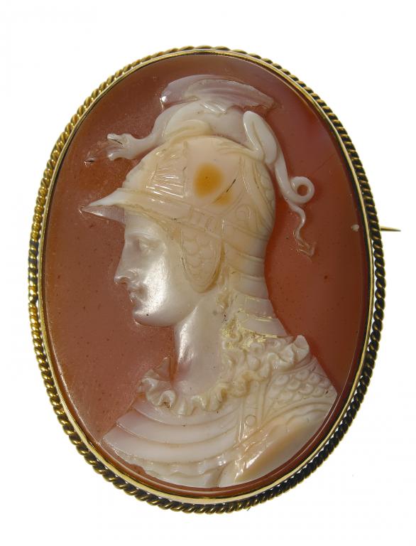 Appraisal: A HARDSTONE CAMEO BROOCH with an agate carving of a