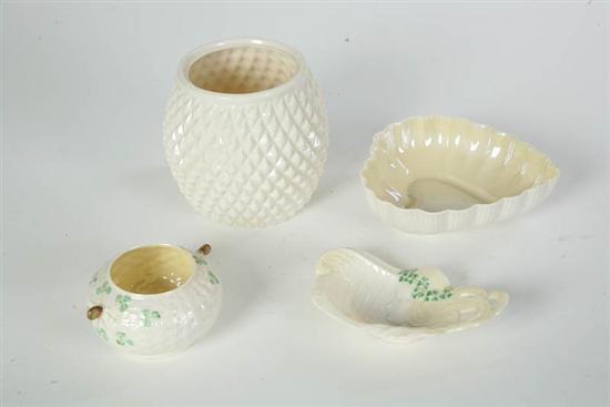 Appraisal: FOUR PIECES OF IRISH BELLEEK - A diamond pattern biscuit