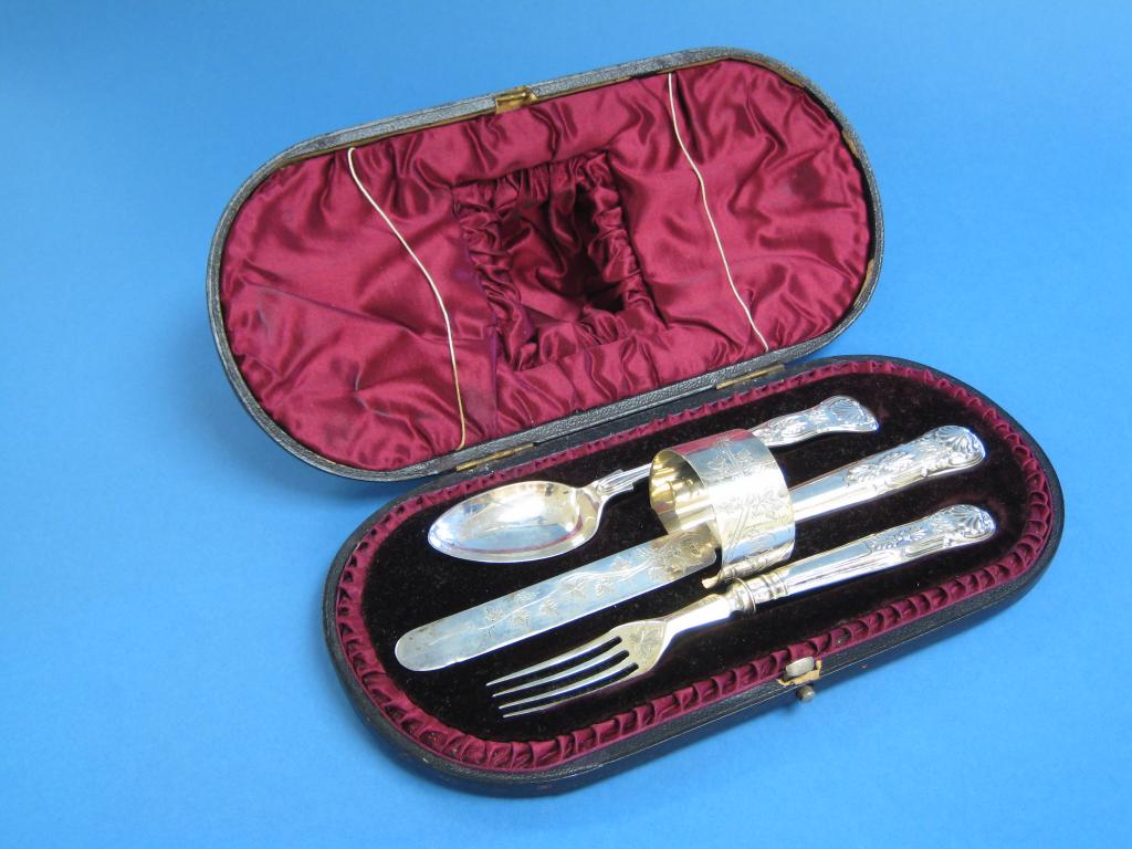 Appraisal: A Victorian Christening Knife Fork Spoon and Napkin Ring fruiting