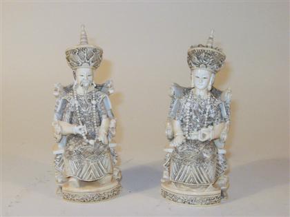 Appraisal: Pair of Chinese elephant ivory figuresComprised of robustly carved Emperor