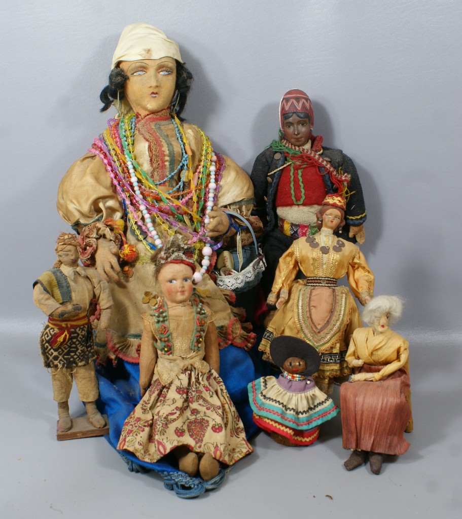 Appraisal: Dolls mainly cloth largest a seated gypsy fortune teller also