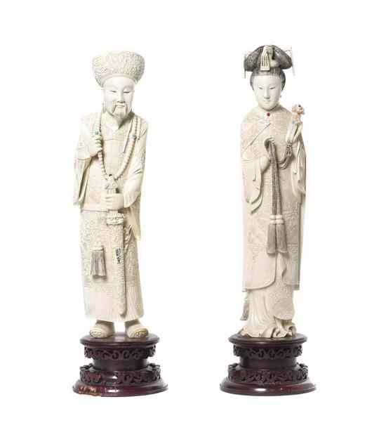 Appraisal: A Pair of Carved Ivory Models of an Emperor and