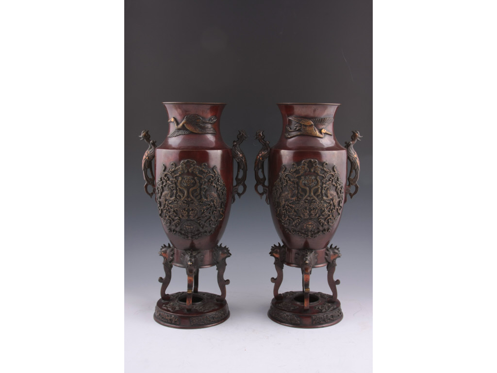 Appraisal: Pair of Japanese Footed Bronze Urns th c heavily decorated