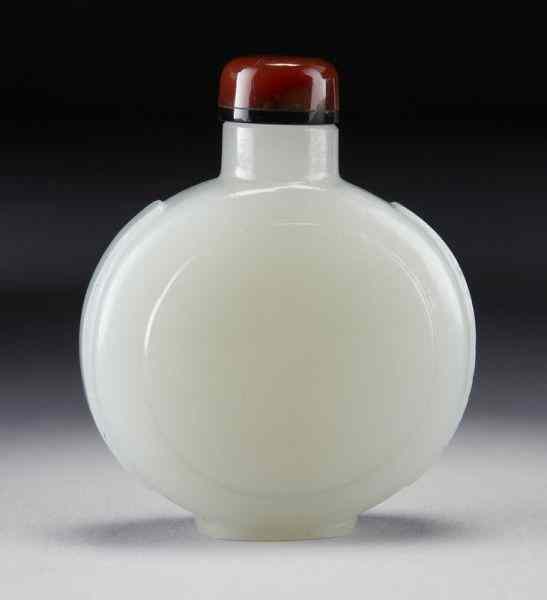 Appraisal: Chinese Qing carved white jade snuff bottle withan agate stopper