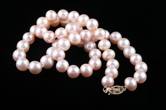 Appraisal: CULTURED PEARL NECKLACE Strand of mm- mm light pink cultured