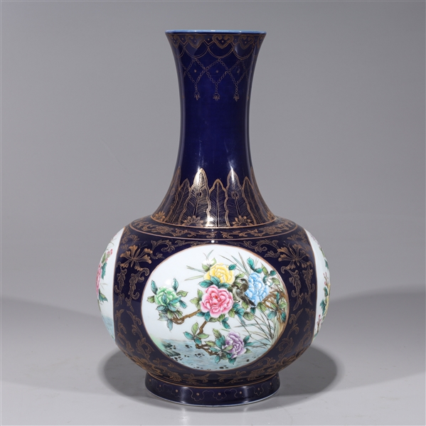 Appraisal: Chinese blue ground gilt and enameled porcelain vase with bird