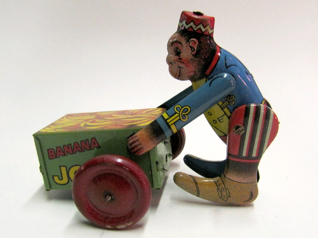 Appraisal: s s English tinplate toy 'Banana Joe' modelled as a