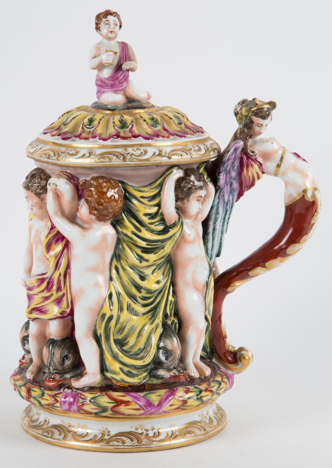 Appraisal: Capodimonte porcelain lidded tankard early th century putti relief decoration