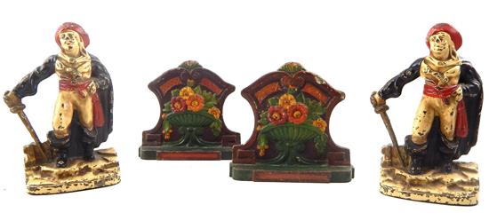 Appraisal: Two pairs painted cast-metal bookends pair full-relief standing buccaneers brandishing