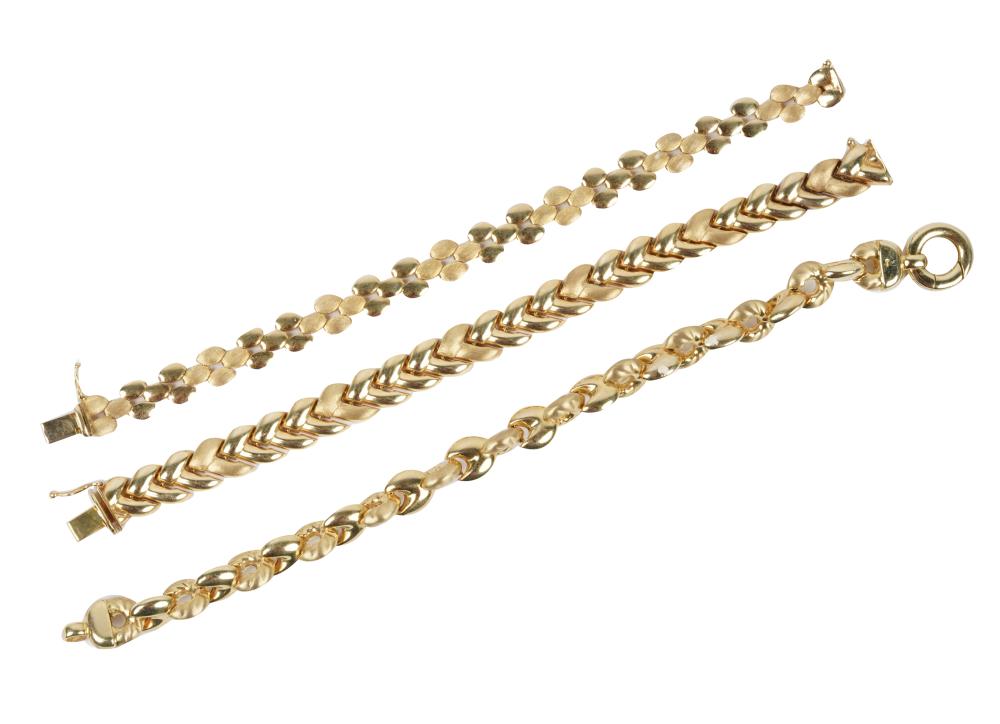 Appraisal: THREE ITALIAN KARAT YELLOW GOLD BRACELETScomprising one alternating Florentine and