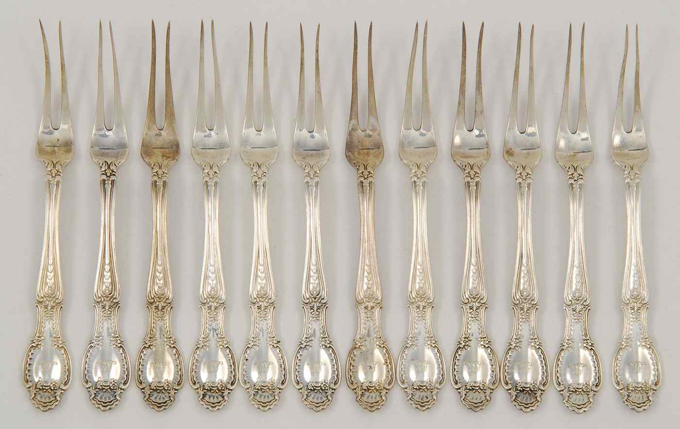 Appraisal: TWELVE TIFFANY STERLING SILVER FRUIT FORKSIn the Richelieu'' pattern Monogrammed