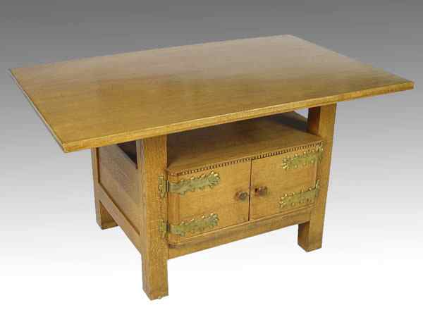 Appraisal: AESTHETIC MOVEMENT GOLDEN OAK CENTER TABLE door storage compartment base