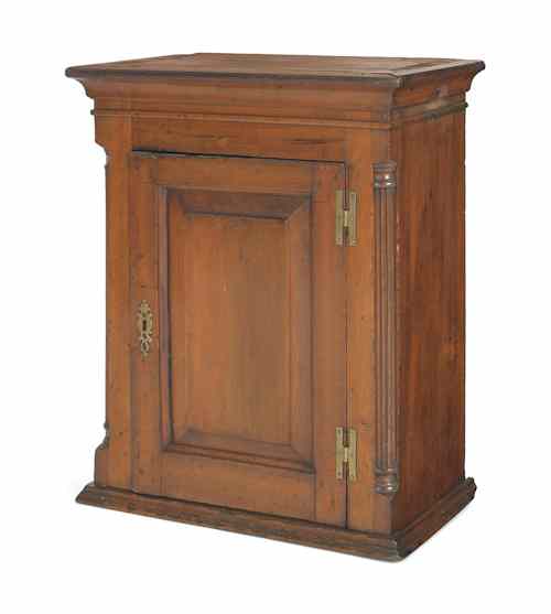 Appraisal: Pennsylvania Chippendale pine hanging cupboard ca with a raised panel