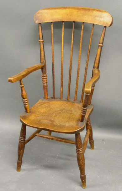 Appraisal: English yew wood Windsor armchair h x w x d