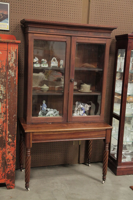 Appraisal: TWO PIECE BOOKCASE DESK Walnut having a molded cornice glazed