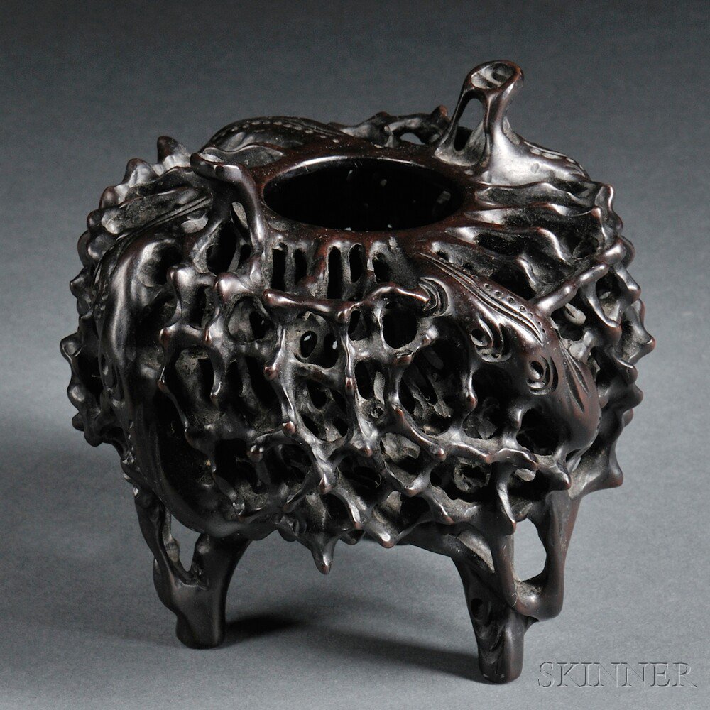 Appraisal: Reticulated Hardwood Censer China ovoid tripod form with a pair