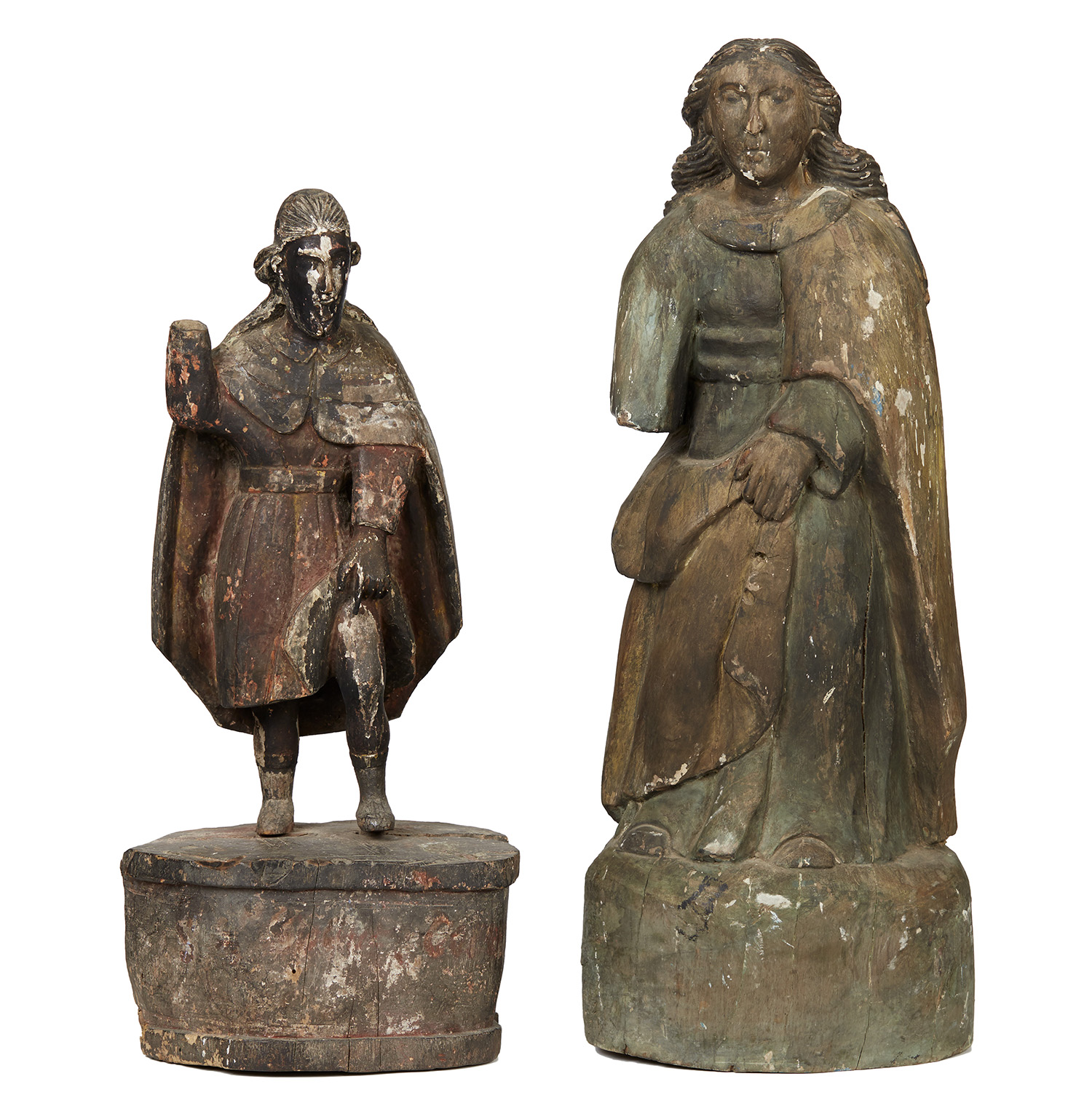 Appraisal: TWO SPANISH COLONIAL SANTOS FIGURES Depicting saints in robes and