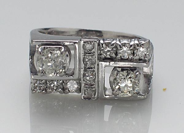 Appraisal: A diamond and platinum ring estimated total diamond weight ct