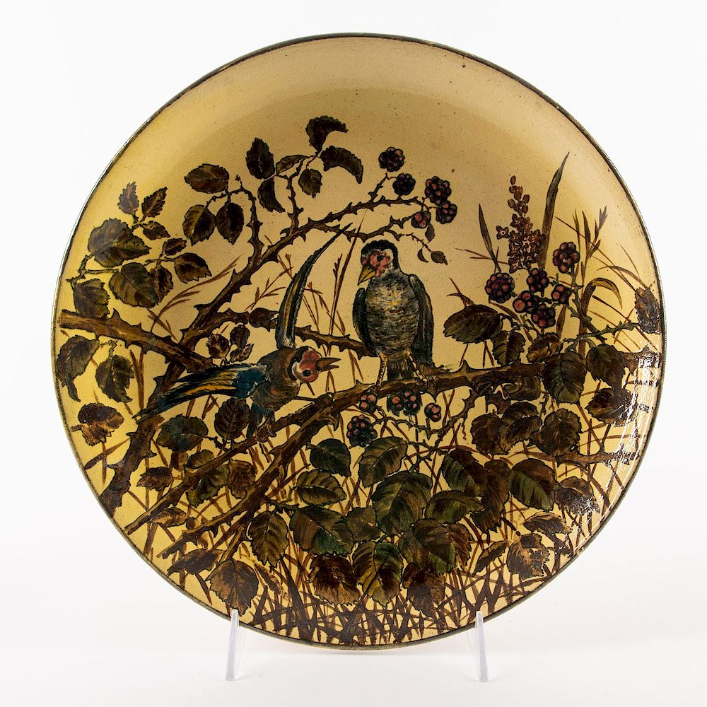 Appraisal: DOULTON LAMBETH AESTHETIC MOVEMENT CHARGER PLATE Yellow with naturalistic colors