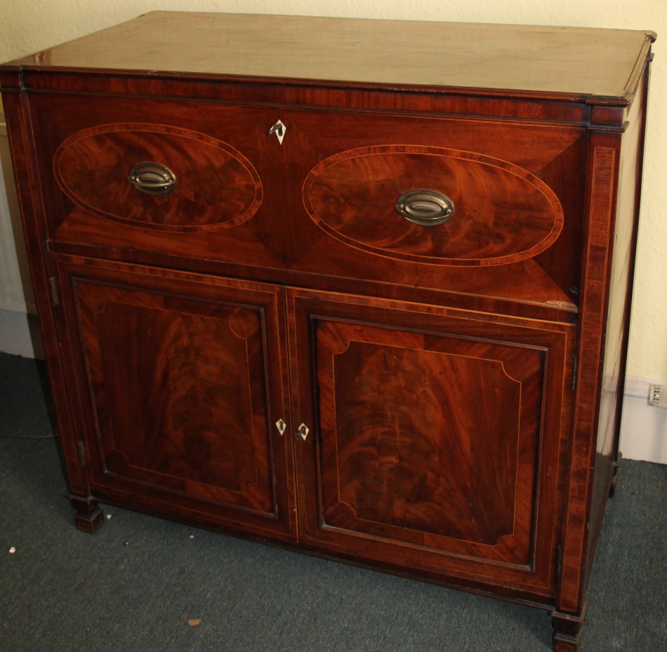 Appraisal: An early thC mahogany secretaire chest the crossbanded top above