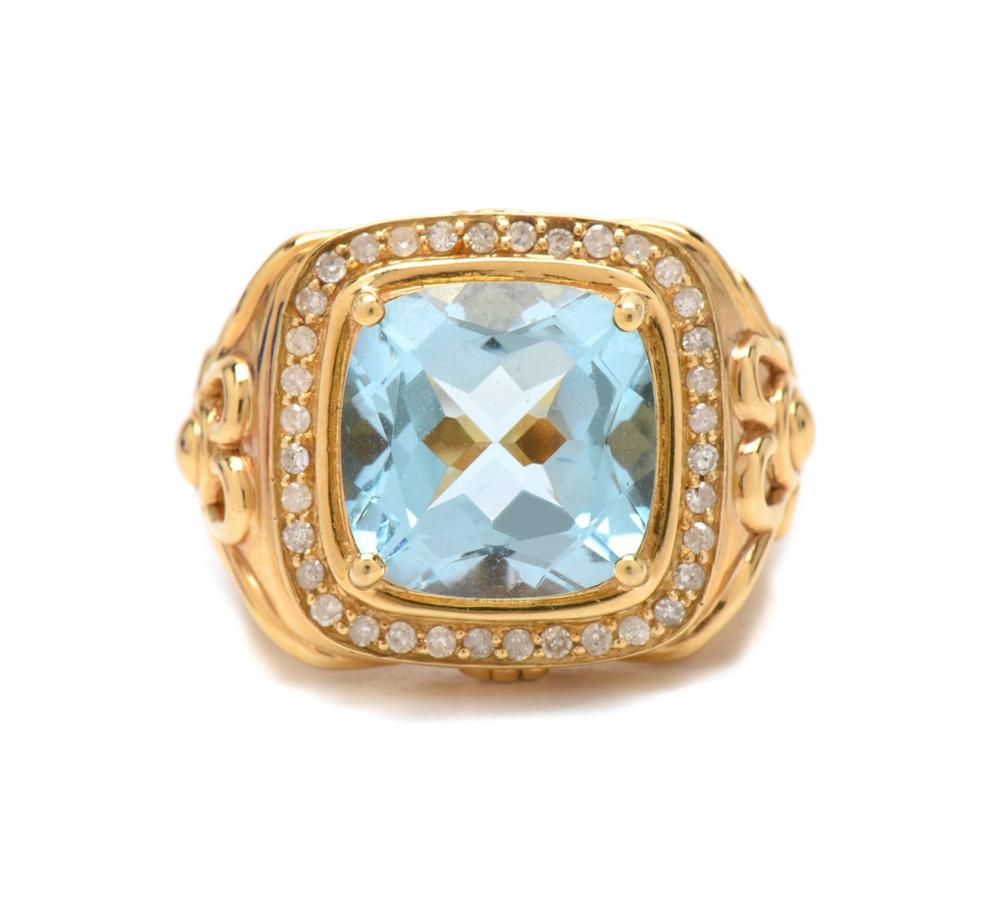 Appraisal: BLUE TOPAZ DIAMOND AND EIGHTEEN KARAT GOLD RING The hollow