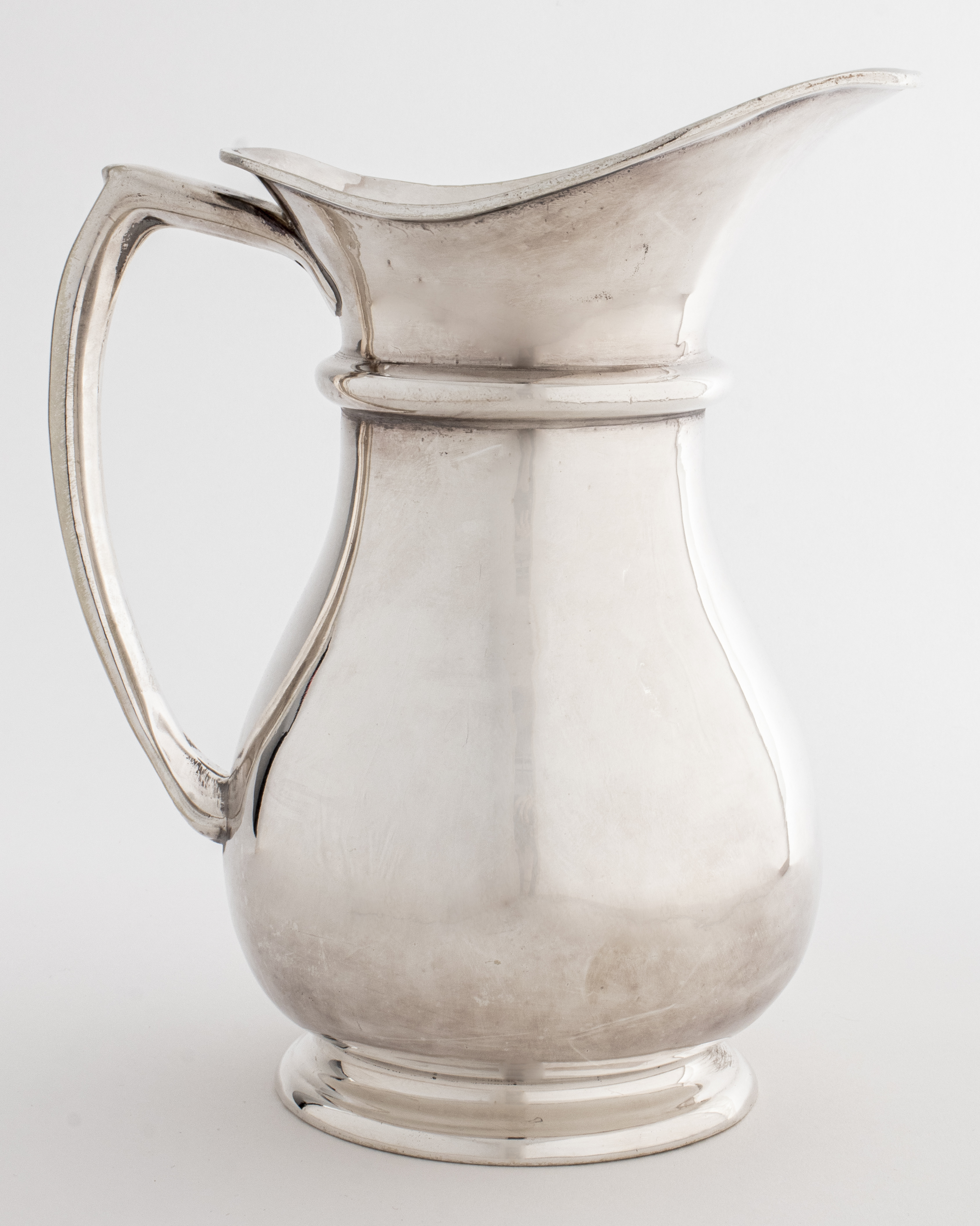 Appraisal: MORTON-PARKER SILVER PLATED PITCHER Morton-Parker silver plated pitcher H x