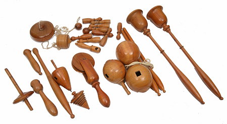 Appraisal: A GROUP OF TURNED WOODEN CHILDREN'S GAMES AND TOYS to