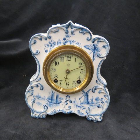 Appraisal: New Haven Porcelain Cased Clock Delft style with butterfly ship