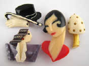 Appraisal: Four plastic costume jewellery brooches including Lea Stein and Trifari