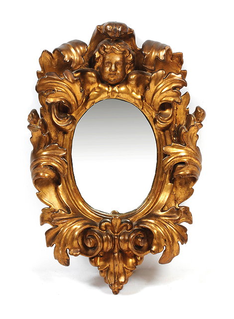 Appraisal: AN TH CENTURY ITALIAN CARVED GILTWOOD WALL MIRROR with a