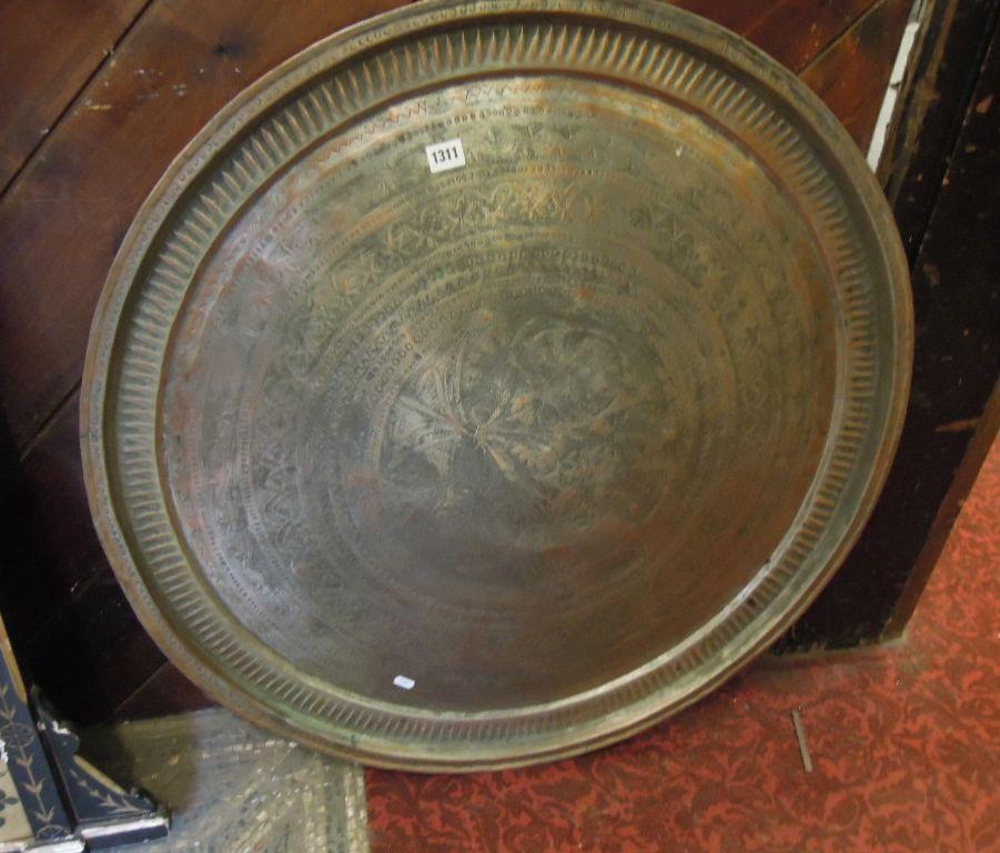 Appraisal: A large Eastern tin and copper tray of circular form